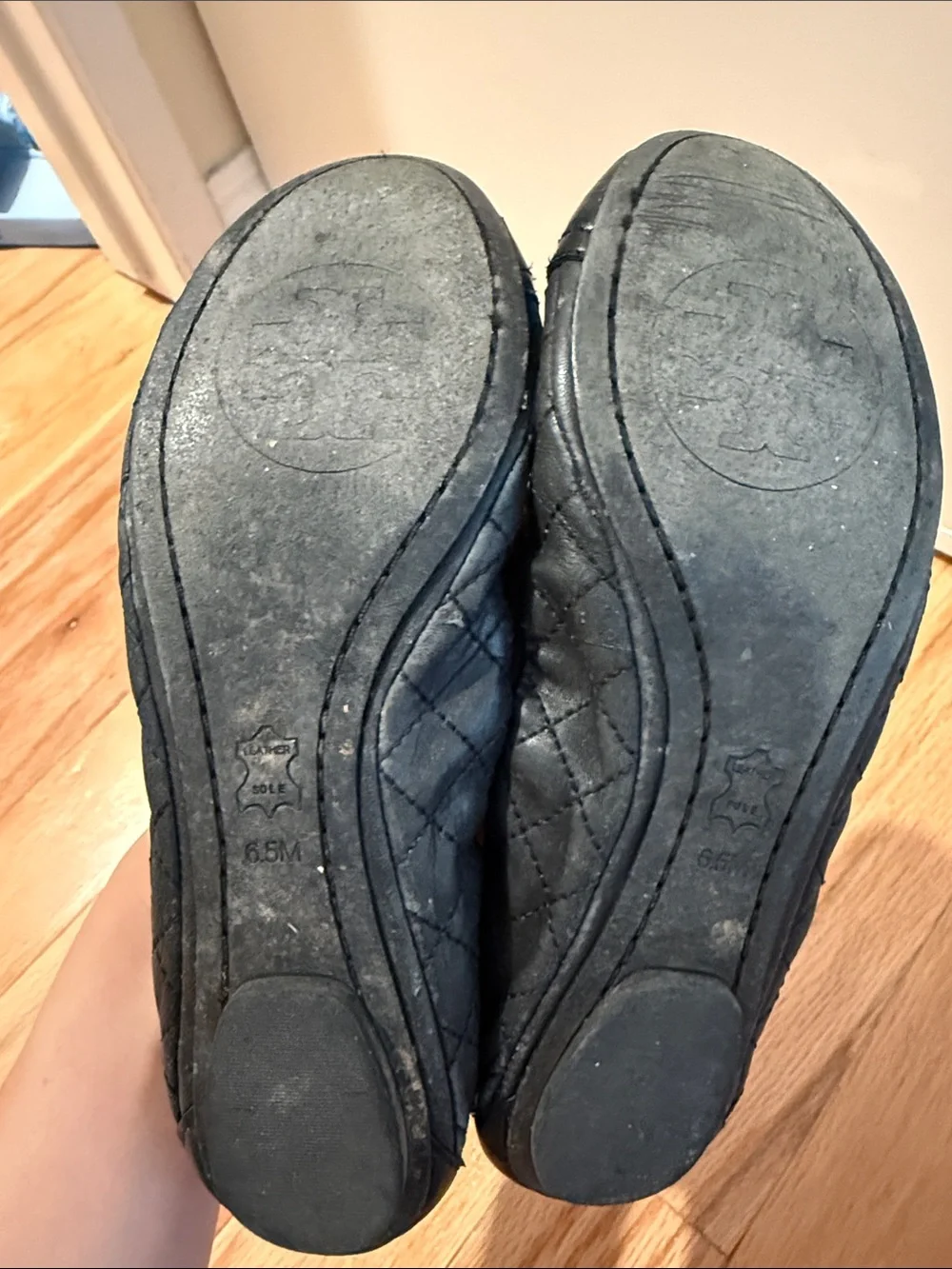 Tory Burch Black Quilted Leather Ballet Flats with Gold Logo Heel